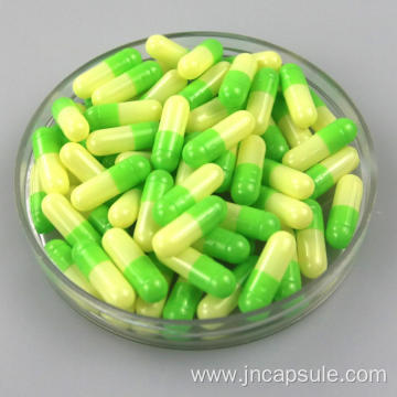 Size 00 yellow and green capsules